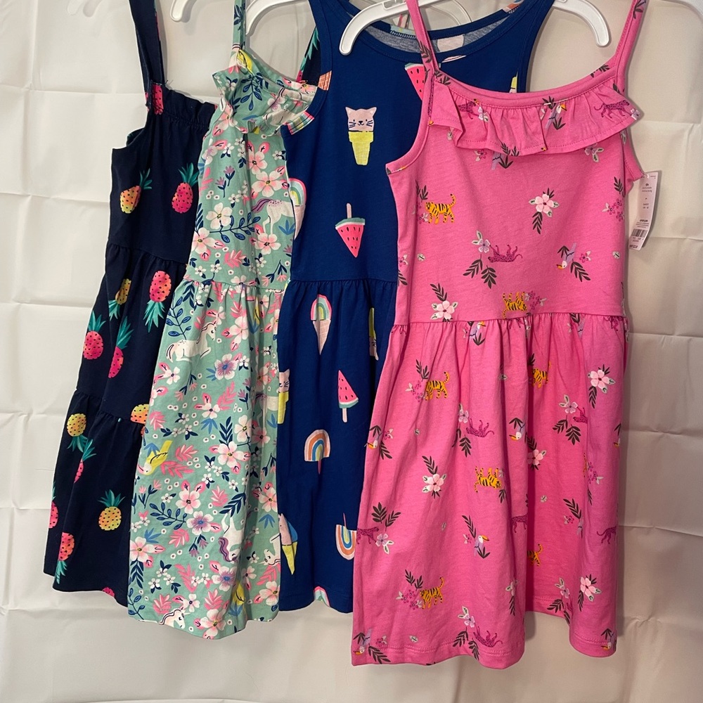 Set of 4 Carters summer dresses. Size 6x. Some new with tags and one worn once.